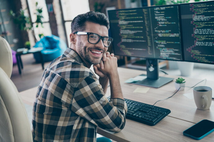 Developer in front of a Computer