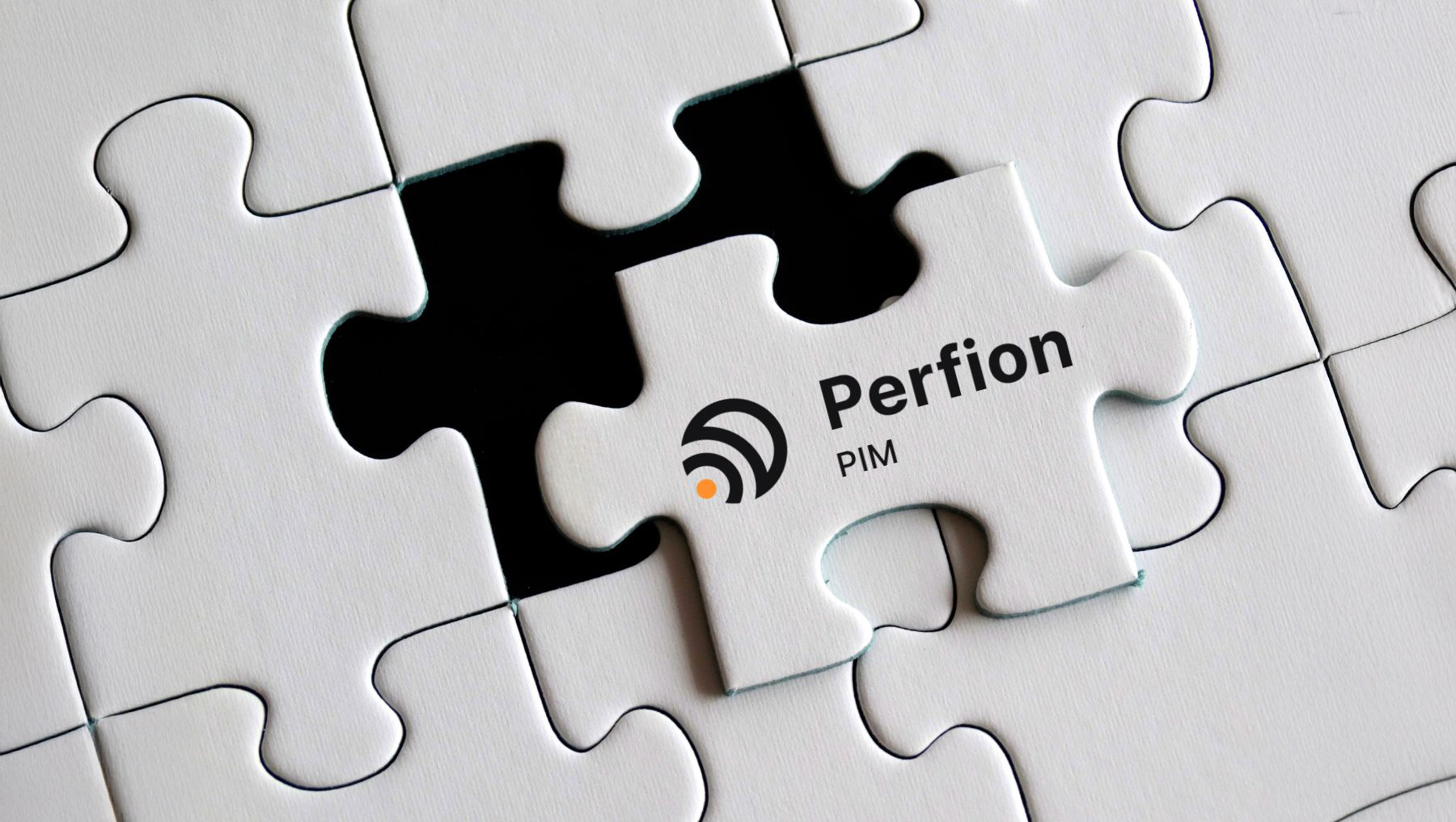 Puzzle piece with Perfion logo symbolizing the connection of PIM systems.